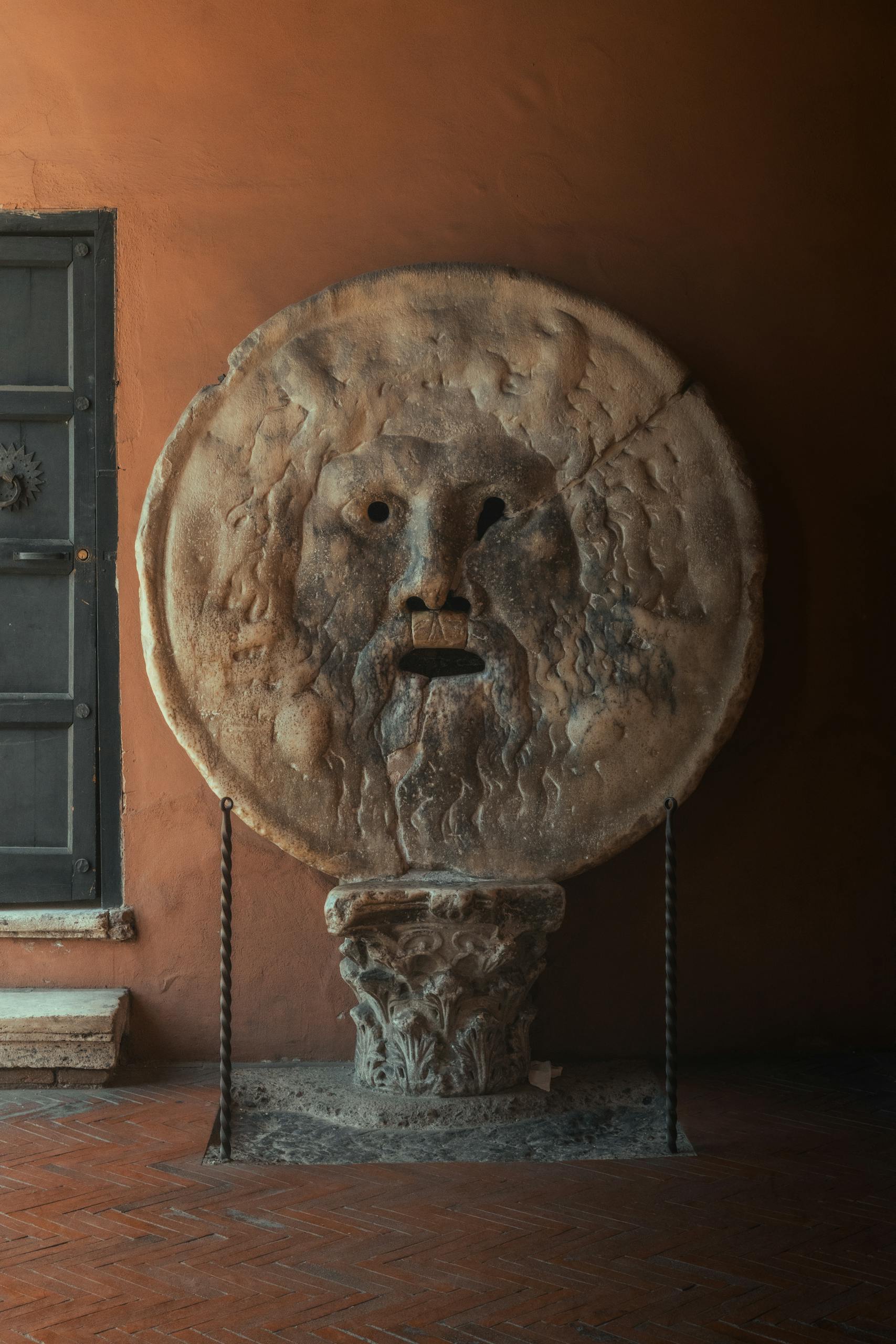 Ancient Roman Bocca della Verità sculpture, iconic landmark in Rome, Italy.